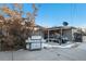 Backyard with parked car and grill at 1961 W Kentucky Ave, Denver, CO 80223