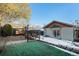 Backyard with detached structure and small yard at 1961 W Kentucky Ave, Denver, CO 80223