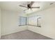 Bright bedroom with neutral walls and carpet flooring at 1961 W Kentucky Ave, Denver, CO 80223