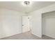 Bright bedroom with neutral walls and carpet flooring at 1961 W Kentucky Ave, Denver, CO 80223