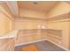 Large walk-in closet with ample shelving and hanging space at 1961 W Kentucky Ave, Denver, CO 80223