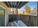 Private patio with snowy ground and view of complex at 9725 E Harvard Ave # 349, Denver, CO 80231