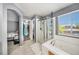 A Primary bathroom with a shower, large tub, and walk in closet at 10289 Dresden St, Firestone, CO 80504