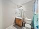 Clean bathroom featuring a vanity with a sink, a mirror, a toilet, and a shower with curtain at 10289 Dresden St, Firestone, CO 80504