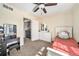 Bedroom features a bed, closet, and a large vanity at 10289 Dresden St, Firestone, CO 80504