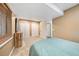A cozy bedroom with two closets, a wooden dresser, and carpeted flooring offers ample storage and comfort at 10289 Dresden St, Firestone, CO 80504