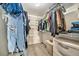 Walk-in closet providing ample storage with shelving, hanging space, and organized compartments at 10289 Dresden St, Firestone, CO 80504