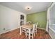 Cozy dining area with a wooden table, seating for four, and stylish decor at 10289 Dresden St, Firestone, CO 80504