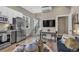 Bright living space with stainless appliances, stairs, modern furniture and dining area at 3219 W 19Th Ave # 4, Denver, CO 80204