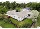 Aerial view of a well-maintained single story home with a fenced yard and lush landscaping at 11762 W 34Th Ave, Wheat Ridge, CO 80033