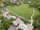 An aerial view highlights the home's proximity to walking trails and green space in a vibrant neighborhood at 11762 W 34Th Ave, Wheat Ridge, CO 80033