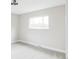Bright bedroom features neutral walls, plush carpet, and a modern style window at 11762 W 34Th Ave, Wheat Ridge, CO 80033