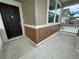 Close up of the front entrance featuring a covered porch with a modern design at 16562 E 109Th Ave, Commerce City, CO 80022