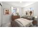 Stylish bedroom with modern decor, neutral tones, and bright natural light at 22123 E 38Th Pl, Aurora, CO 80019