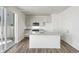 Open concept kitchen with center island, stainless steel appliances, granite countertops, and modern finishes at 22123 E 38Th Pl, Aurora, CO 80019