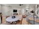 Open-concept living room featuring hardwood floors and modern decor at 5738 N Vivian St, Arvada, CO 80002