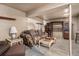 Finished basement with carpet and furniture at 2813 S Xanadu Way, Aurora, CO 80014