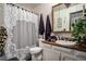 Bathroom with vanity and decorative shower curtain at 2813 S Xanadu Way, Aurora, CO 80014