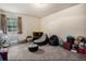Bedroom with carpet flooring, an inflatable couch, and a window at 2813 S Xanadu Way, Aurora, CO 80014
