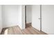 Neutral bedroom showcasing hardwood floors and a bright, airy atmosphere at 5462 S Cedar St, Littleton, CO 80120