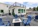 Modern home featuring an upper-level patio with comfortable seating and an outdoor dining area at 5462 S Cedar St, Littleton, CO 80120