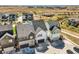 A charming street view highlighting the home's modern facade and convenient attached garage at 16546 Umatilla Place, Broomfield, CO 80023