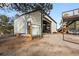 Exterior garage and shop with multiple doors and space for vehicles at 3046 S Alpine Dr, Evergreen, CO 80439