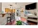 Inviting living area with tile floors, access to the kitchen, and natural light at 3046 S Alpine Dr, Evergreen, CO 80439