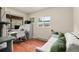 Bright office featuring hardwood floors and natural light at 3046 S Alpine Dr, Evergreen, CO 80439