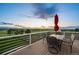 Outdoor dining on this back deck with distant views, perfect for entertaining or relaxing with Gathering and friends at 6785 Arrowhead Cir, Elizabeth, CO 80107