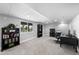 Finished basement with a home office setup and ample storage space at 6785 Arrowhead Cir, Elizabeth, CO 80107