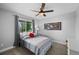 Cozy bedroom with a ceiling fan, neutral colors, and a comfortable bed at 6785 Arrowhead Cir, Elizabeth, CO 80107