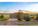 Beautiful home with a three-car garage, mature trees, and well-manicured lawn at 6785 Arrowhead Cir, Elizabeth, CO 80107