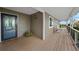 Inviting front porch with seating and flower pots, providing a tranquil welcome to the home at 6785 Arrowhead Cir, Elizabeth, CO 80107
