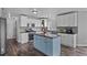 Well-designed kitchen with custom cabinets, updated appliances, and a large island, ideal for cooking and entertaining at 6785 Arrowhead Cir, Elizabeth, CO 80107