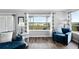 Bright living room with large windows that showcase scenic views of the exterior landscape at 6785 Arrowhead Cir, Elizabeth, CO 80107