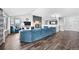 Stylish living room with hardwood floors, a cozy fireplace, and an open layout that is great for entertaining at 6785 Arrowhead Cir, Elizabeth, CO 80107