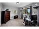 Bright home office with a large window and a stylish desk at 6785 Arrowhead Cir, Elizabeth, CO 80107