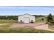 Exterior view of the large outbuilding on the property with ample space for storage and other uses at 6785 Arrowhead Cir, Elizabeth, CO 80107