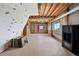 Outbuilding interior with a climbing wall, punching bag, and ample space for activities at 6785 Arrowhead Cir, Elizabeth, CO 80107