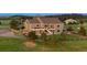 Spacious backyard with a large patio, mature trees, and lush lawn at 6785 Arrowhead Cir, Elizabeth, CO 80107