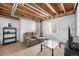 Unfinished basement with concrete walls, offering potential for customization with exposed duct work at 24702 E Hoover Pl, Aurora, CO 80016