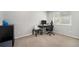 Cozy bedroom featuring neutral walls, a modern desk, and a comfortable workspace for productivity at 24702 E Hoover Pl, Aurora, CO 80016