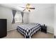 Comfortable bedroom featuring natural light, neutral walls, and carpet at 24702 E Hoover Pl, Aurora, CO 80016