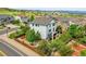 Two story house with backyard and raised garden beds at 2314 Fairway Wood Cir, Castle Rock, CO 80109