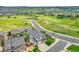 Aerial view of a home near a golf course, showcasing its neighborhood and surrounding green space at 2314 Fairway Wood Cir, Castle Rock, CO 80109