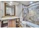 Bathroom featuring a glass enclosed shower, contemporary vanity, and serene lighting at 2314 Fairway Wood Cir, Castle Rock, CO 80109