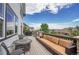 Spacious deck with comfortable seating and grill, perfect for outdoor gatherings and relaxation at 2314 Fairway Wood Cir, Castle Rock, CO 80109