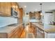 Modern kitchen featuring stainless steel appliances, granite counters, and hardwood floors at 2314 Fairway Wood Cir, Castle Rock, CO 80109