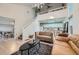 Stylish living room with vaulted ceilings, white walls, and a staircase that goes to an upper loft at 12282 Bannock Cir # A, Denver, CO 80234